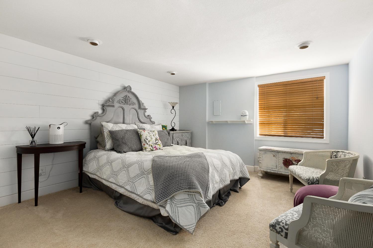 12636 Nottingham Lane Grass Valley, CA 95949 - Photo 20 of 34 a bedroom with a bed and window