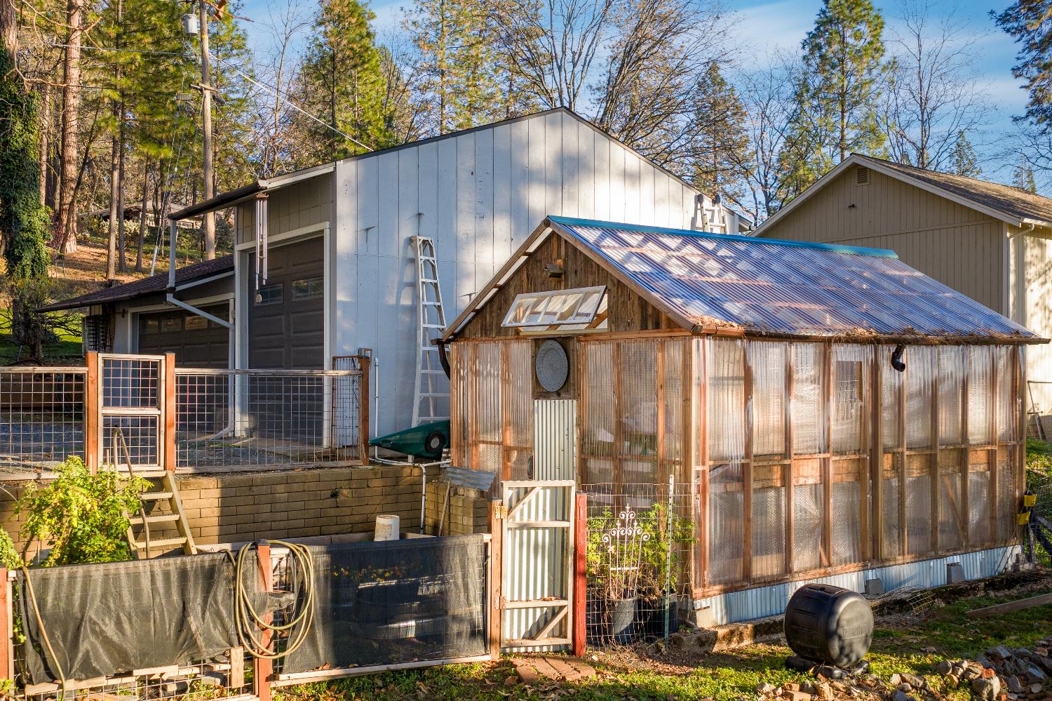 12636 Nottingham Lane Grass Valley, CA 95949 - Photo 32 of 34 front view of a house with a street