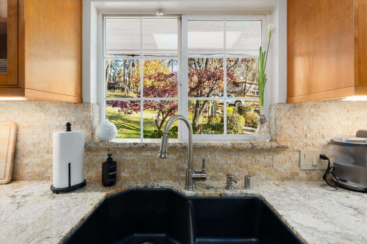 12636 Nottingham Lane Grass Valley, CA 95949 - Photo 9 of 34 a kitchen with a sink and a window