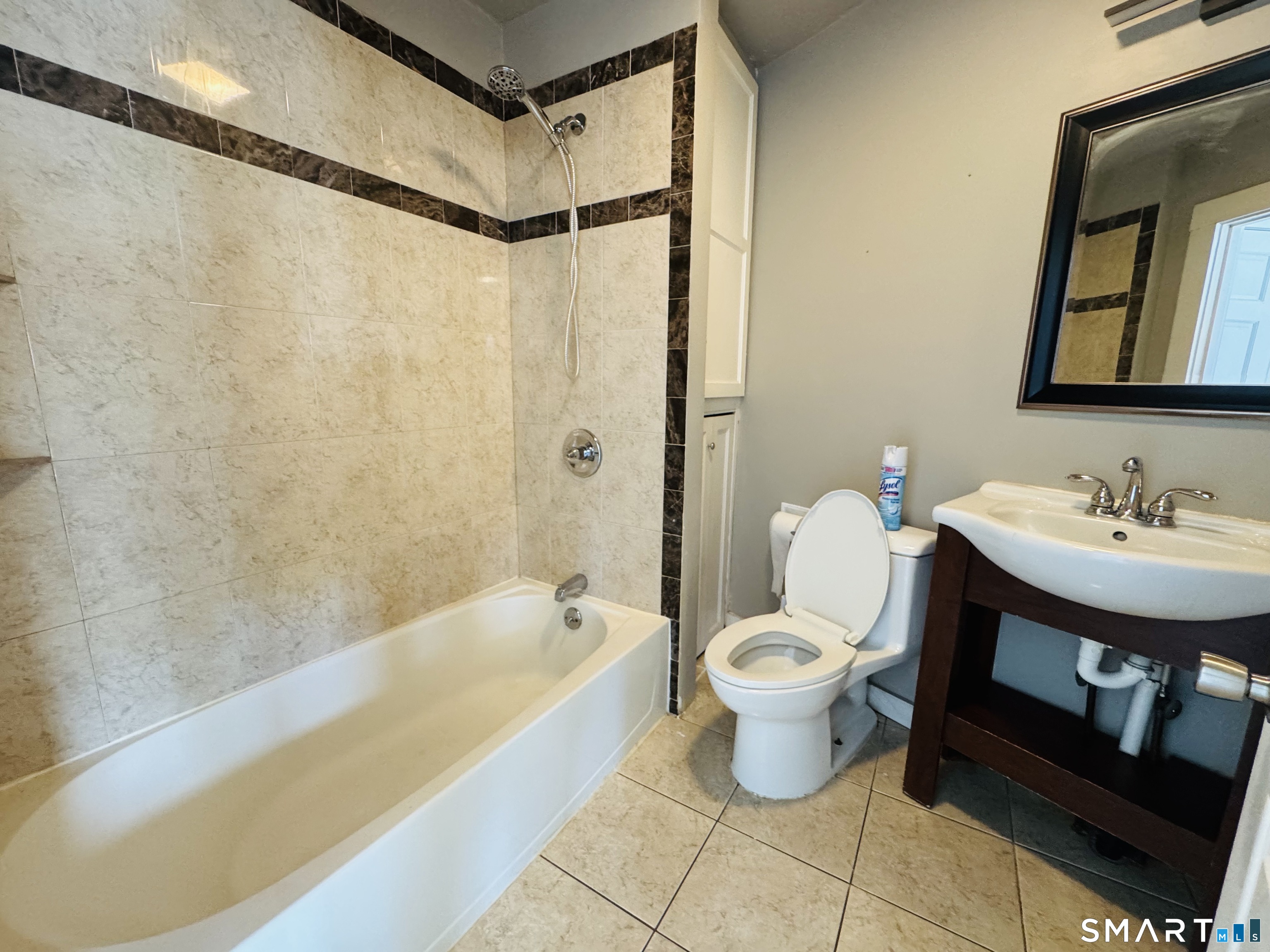 260 Bunker Avenue, Unit 2 Meriden, CT 06450 - Photo 6 of 9 a bathroom with a sink toilet and shower
