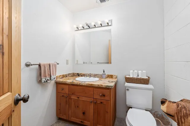 a view of a balcony with wooden floor