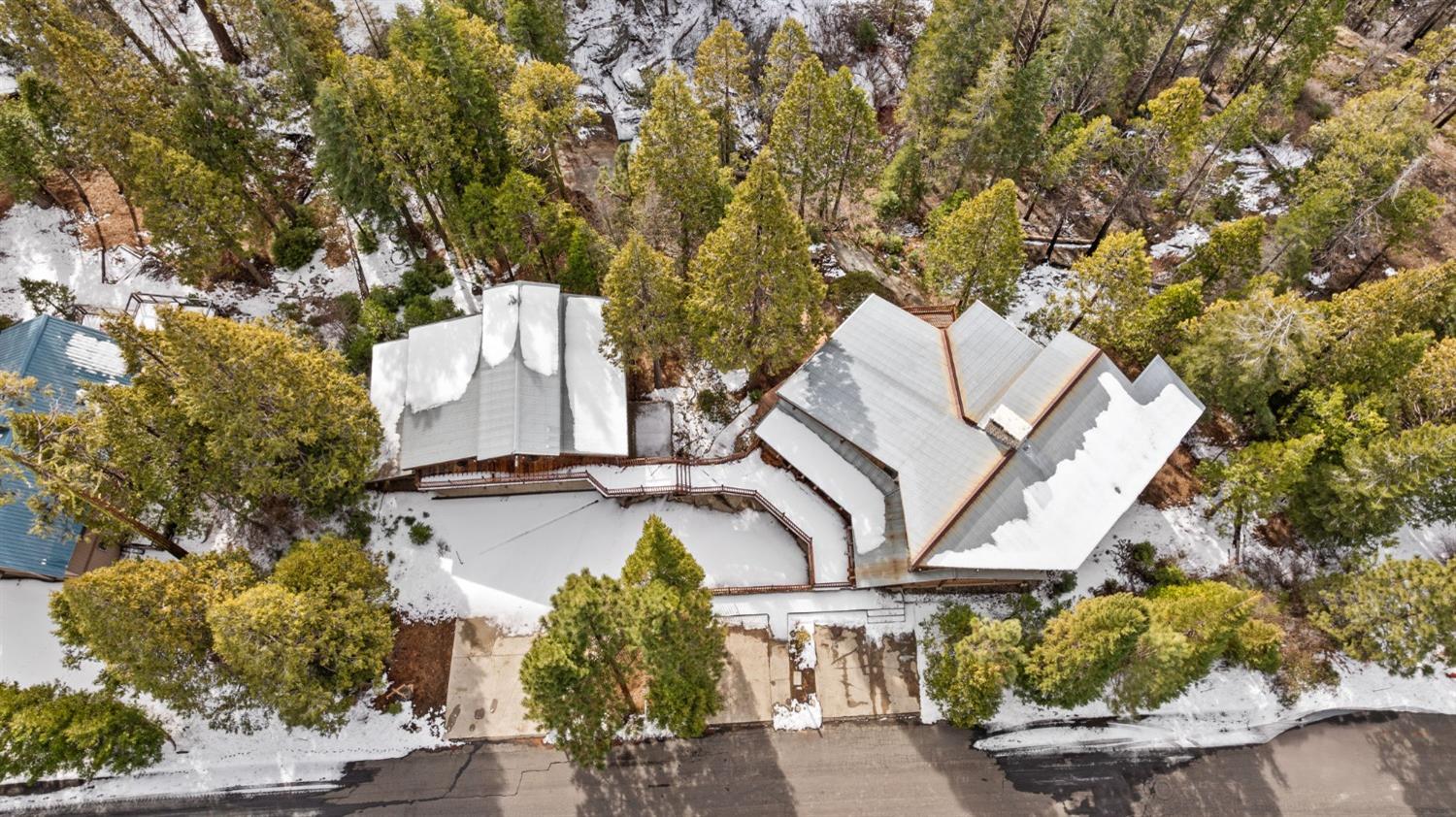 39553 Crest Point Lane Shaver Lake, CA 93664 - Photo 53 of 65 an aerial view of a house with a yard and large trees