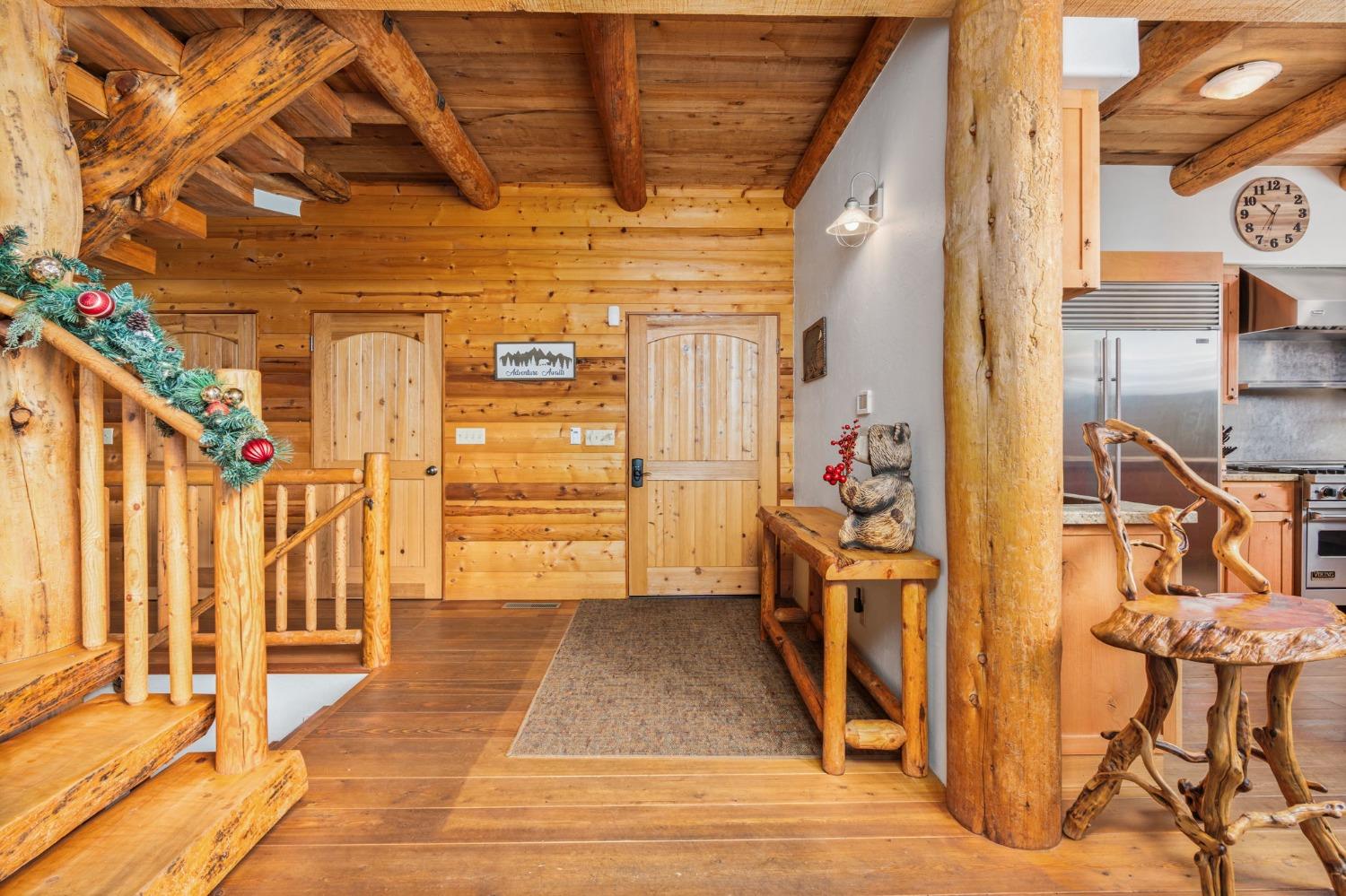 39553 Crest Point Lane Shaver Lake, CA 93664 - Photo 7 of 65 a view of a porch with wooden floor and furniture