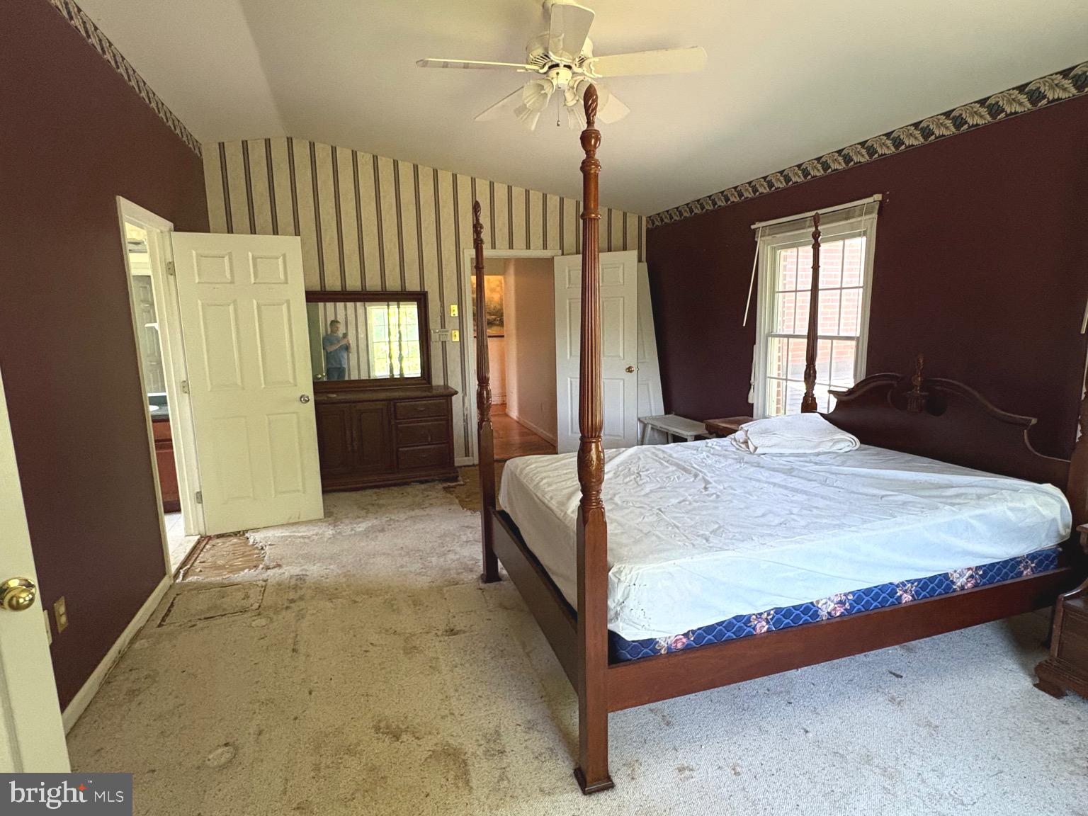 4215 Buffalo Road Mount Airy, MD 21771 - Photo 10 of 44 a bedroom with a bed dresser and a window