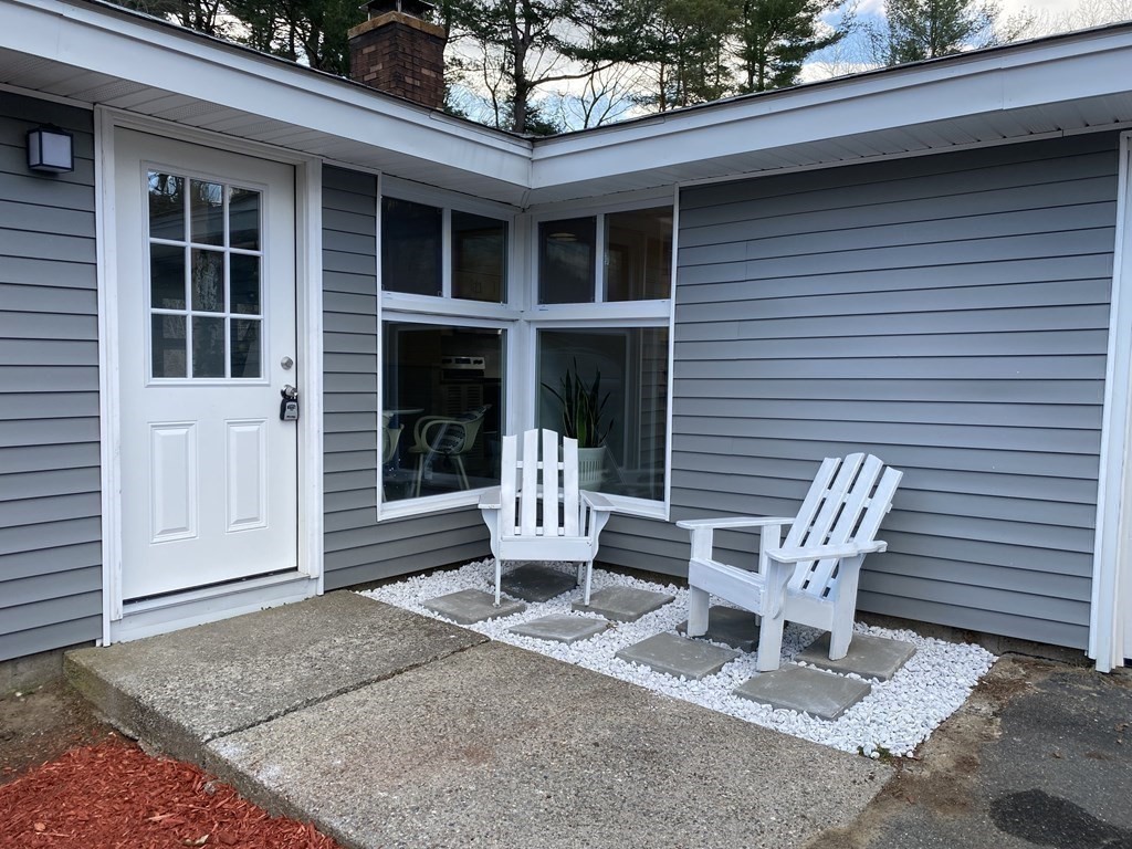 82 Griffin Road Framingham, MA 01701 - Photo 34 of 39 a view of a patio with a table and chairs
