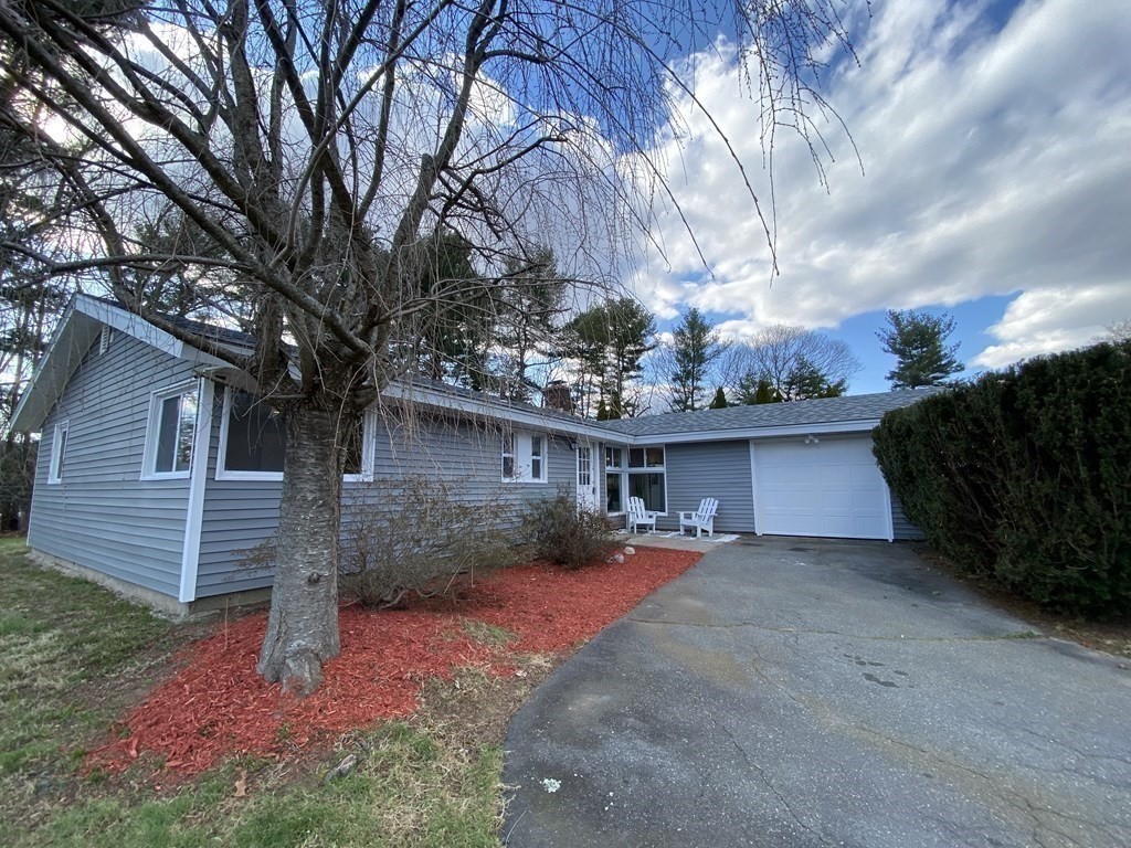 82 Griffin Road Framingham, MA 01701 - Photo 38 of 39 a front view of a house with garden
