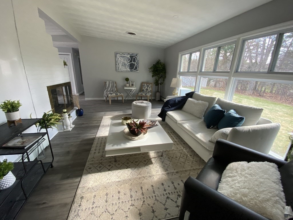 82 Griffin Road Framingham, MA 01701 - Photo 10 of 39 a living room with furniture and a large window