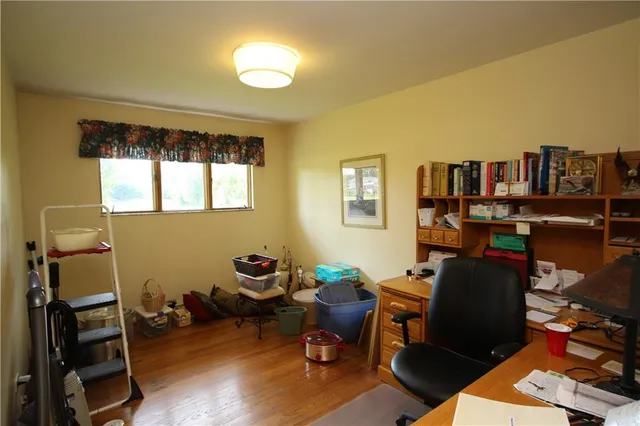 a room with furniture and a window