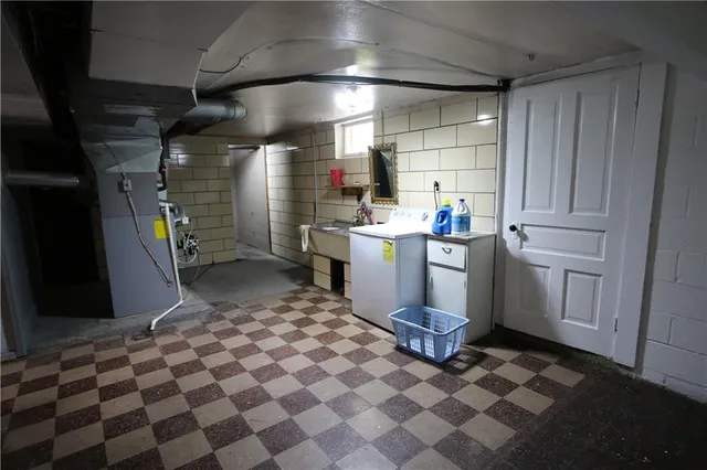a room with a black white checkered floor