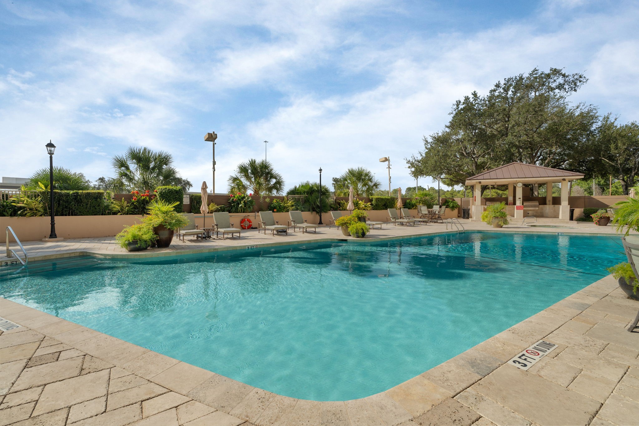 3525 Sage Road, Unit 903 Houston, TX 77056 - Photo 22 of 26 a view of a lake with a yard