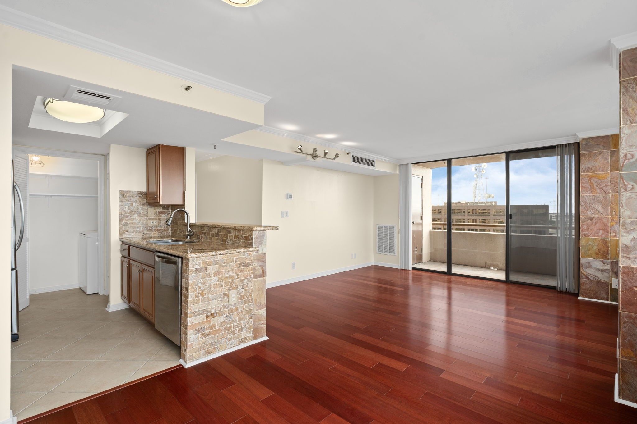 3525 Sage Road, Unit 903 Houston, TX 77056 - Photo 3 of 26 a view of a kitchen with a sink stove top oven and refrigerator