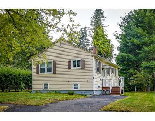 3 Valley Road Natick, MA 01760 - Photo 17 of 17 a front view of a house with a yard and garage