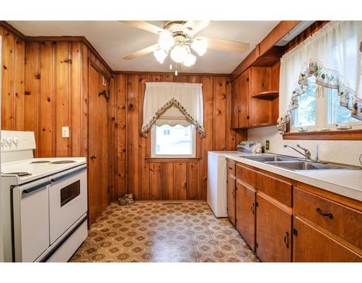 3 Valley Road Natick, MA 01760 - Photo 3 of 17 a kitchen with a sink stove and cabinets