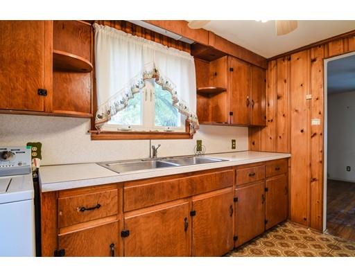 3 Valley Road Natick, MA 01760 - Photo 4 of 17 a bathroom with a sink and a mirror