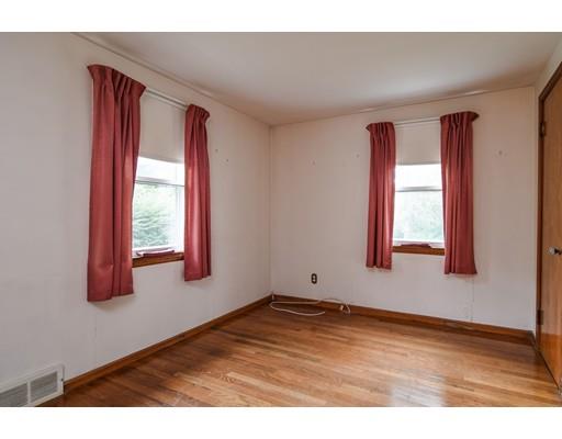 3 Valley Road Natick, MA 01760 - Photo 7 of 17 a view of an empty room with wooden floor and a window