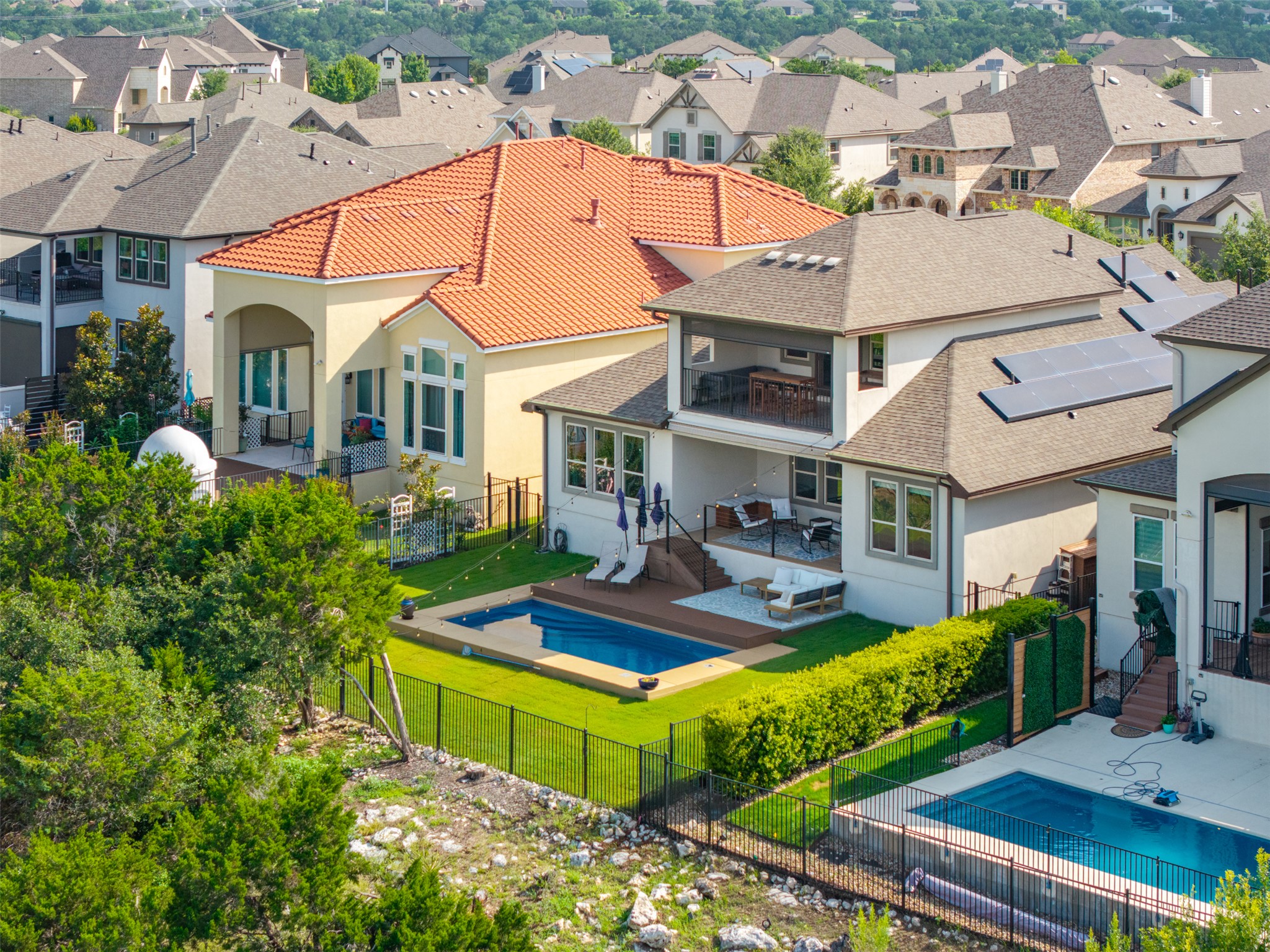 1329 Siena Sunset Road Leander, TX 78641 - Photo 37 of 40 Please notice the paid-in-full Tesla solar panels that save on energy costs!