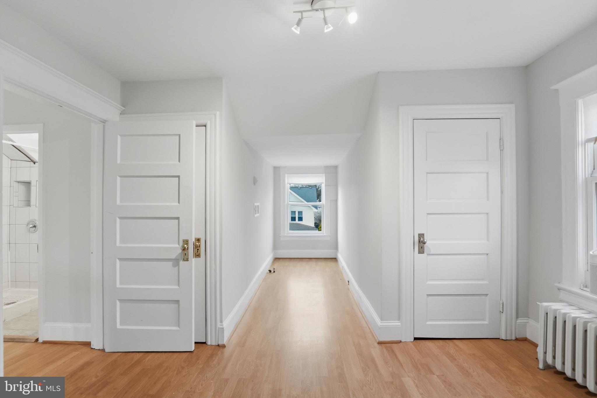 1310 Emerson Street Northwest Washington, DC 20011 - Photo 28 of 38 a view of a hallway with wooden floor