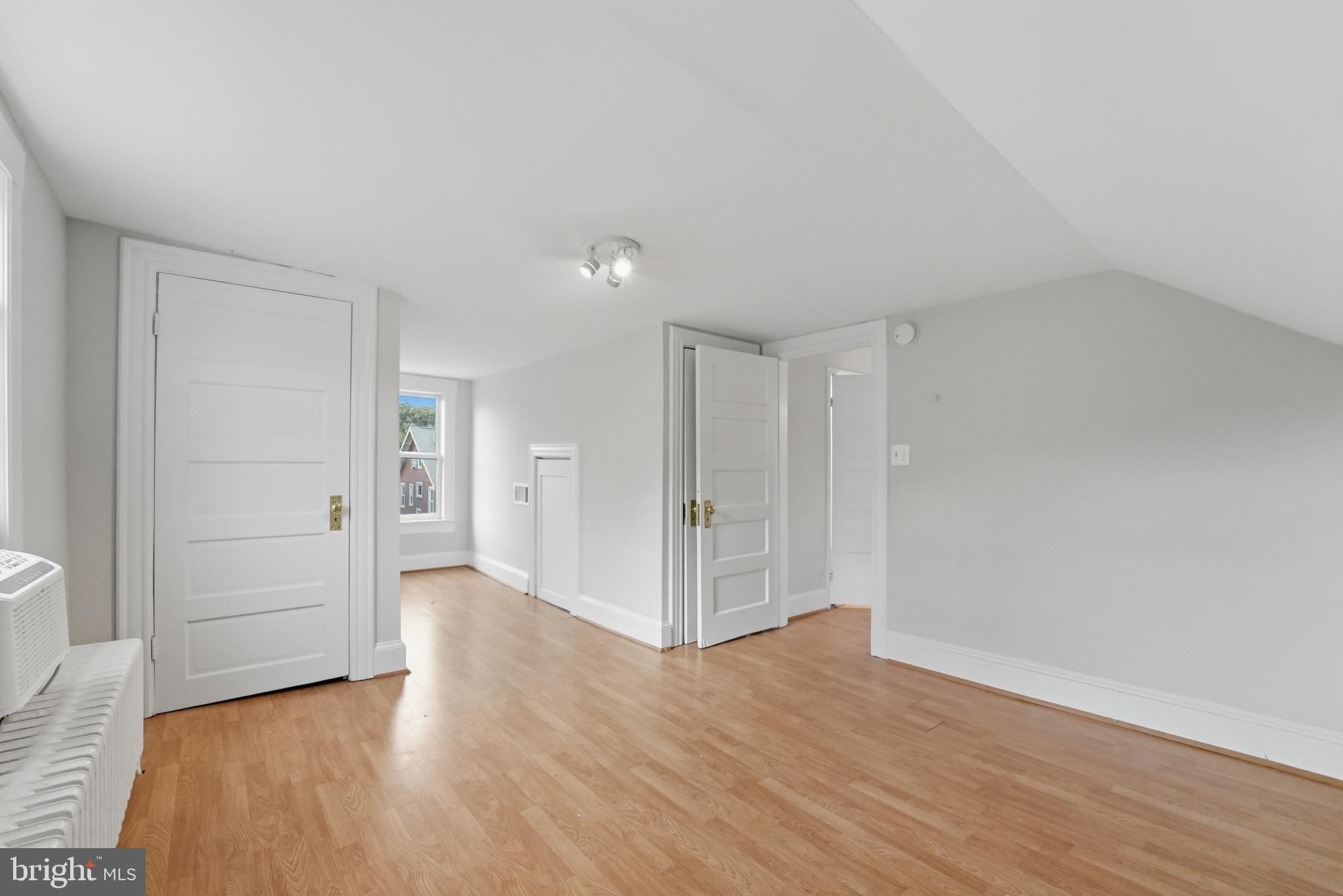1310 Emerson Street Northwest Washington, DC 20011 - Photo 32 of 38 a view of wooden floor and windows in a room