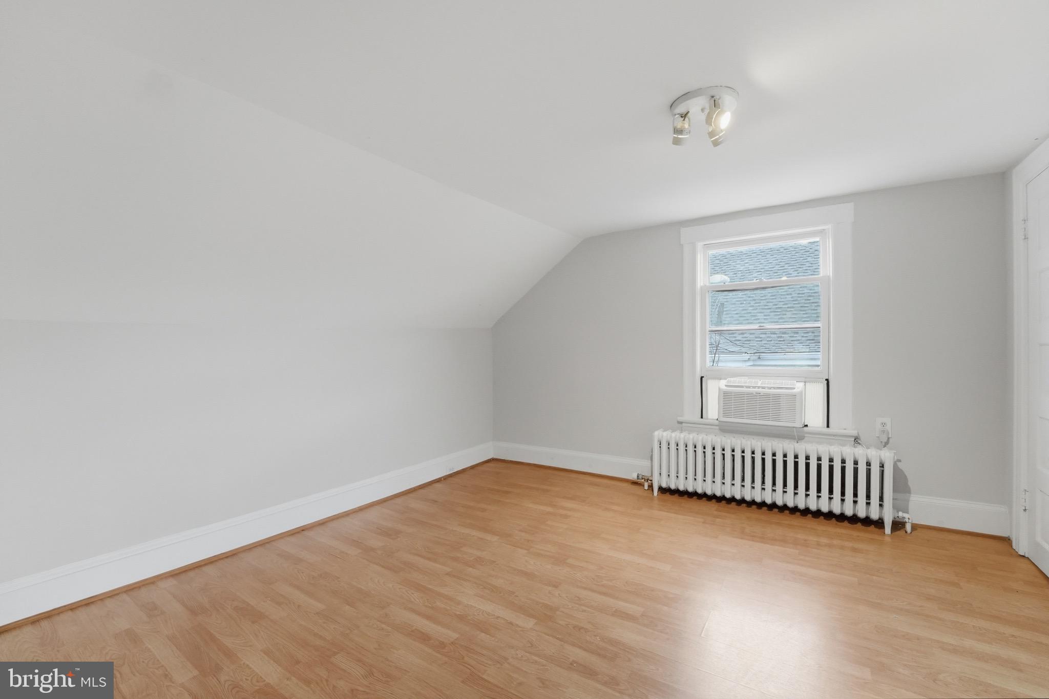 1310 Emerson Street Northwest Washington, DC 20011 - Photo 34 of 38 an empty room with a window