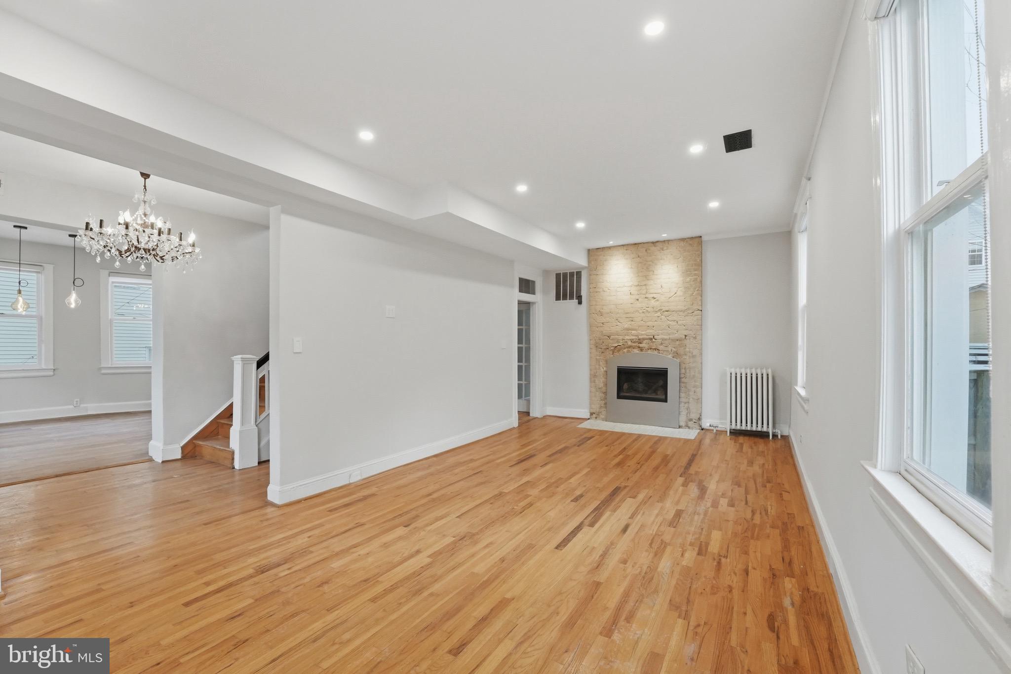 1310 Emerson Street Northwest Washington, DC 20011 - Photo 7 of 38 a view of a livingroom with a chandelier