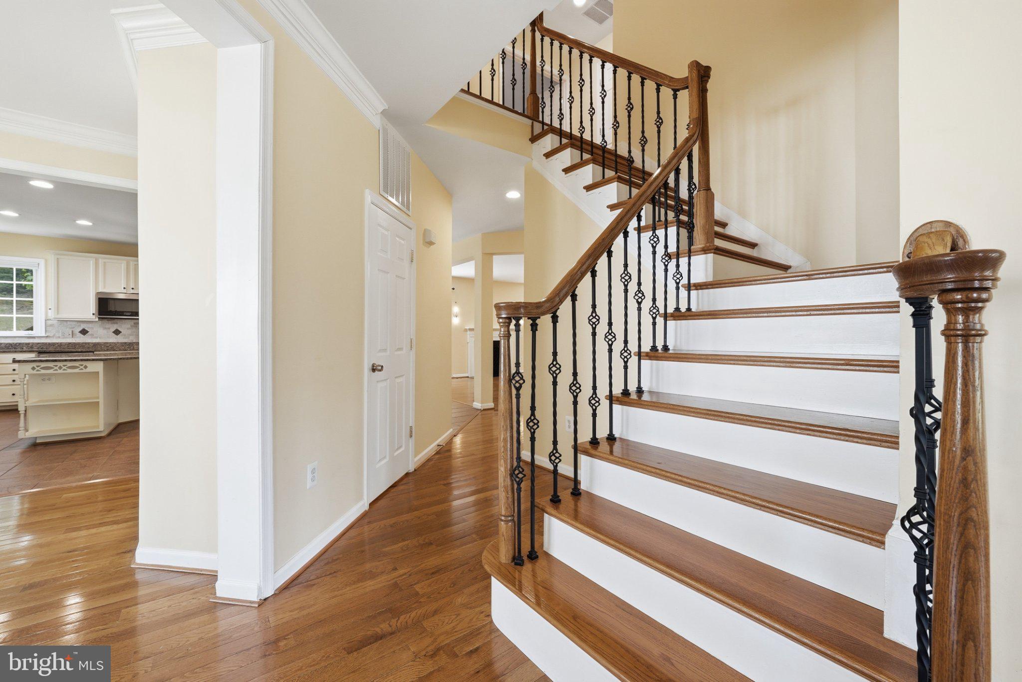 3679 Expedition Drive Triangle, VA 22172 - Photo 5 of 65 a view of entryway and hall with wooden floor