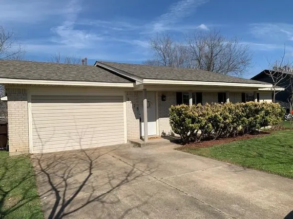 a view of a house with a garage