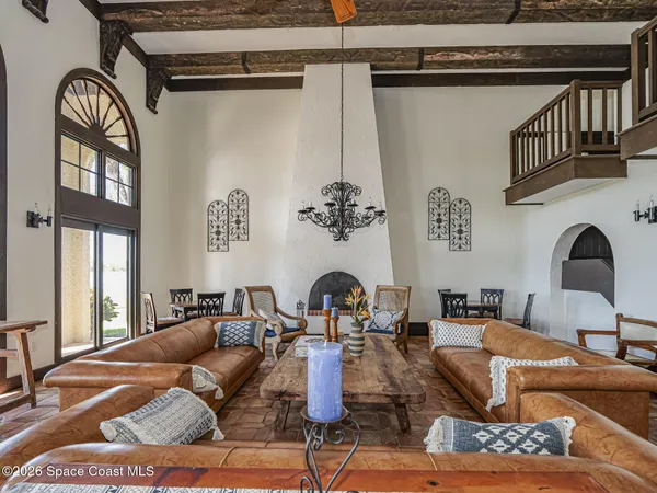 a living room with furniture and window