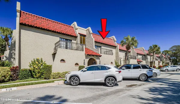 a car parked in front of a house