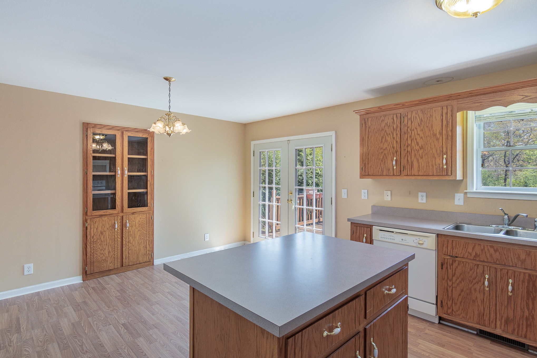 2575 Whitfield Road Clarksville, TN 37040 - Photo 11 of 30 a kitchen with a cabinet a sink and a window