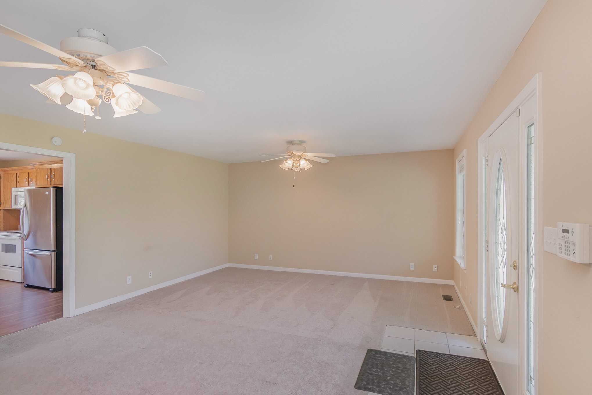 2575 Whitfield Road Clarksville, TN 37040 - Photo 7 of 30 wooden floor in an empty room with a window