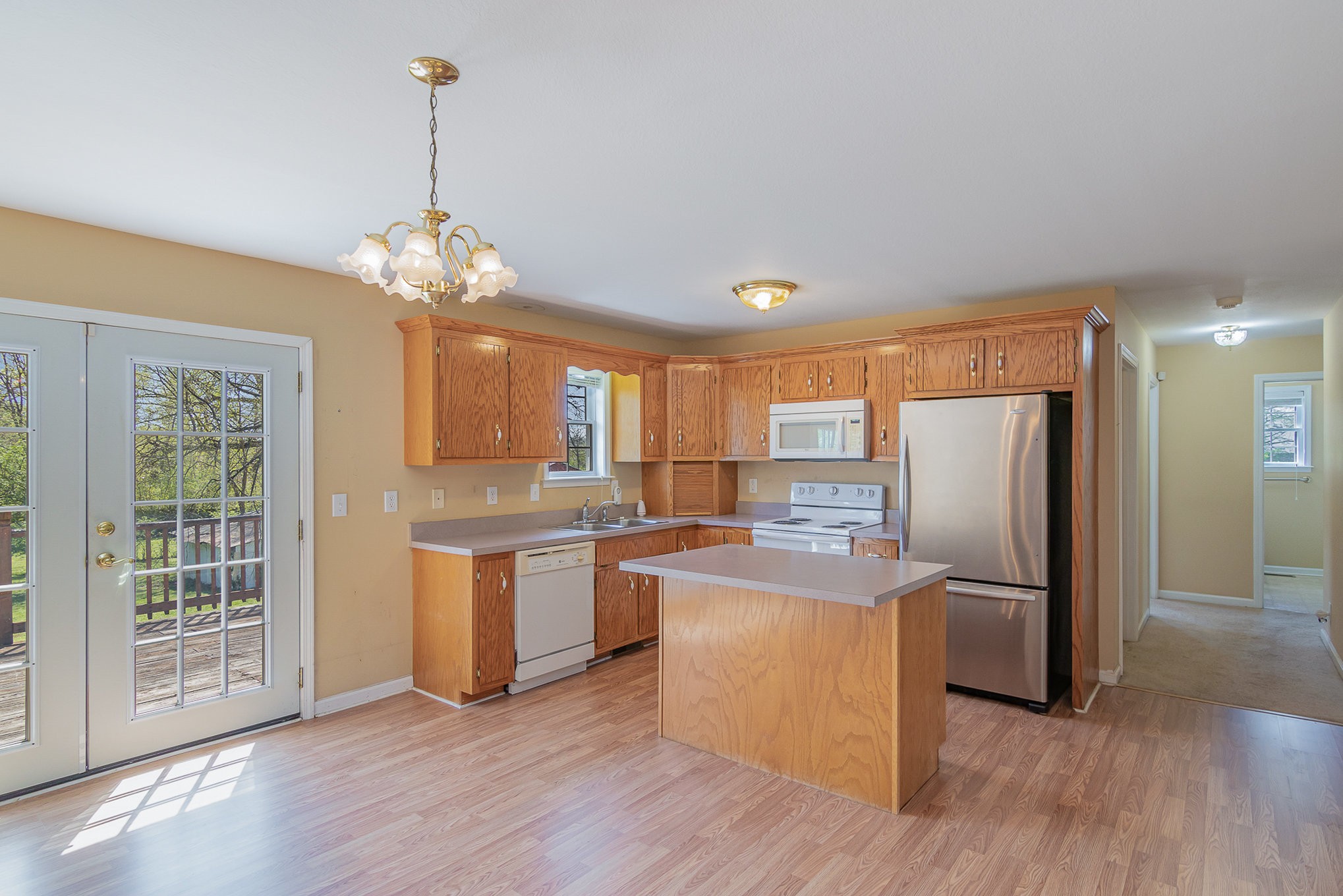 2575 Whitfield Road Clarksville, TN 37040 - Photo 9 of 30 a kitchen with stainless steel appliances granite countertop a refrigerator and a stove top oven