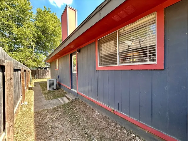a street view with wooden fence
