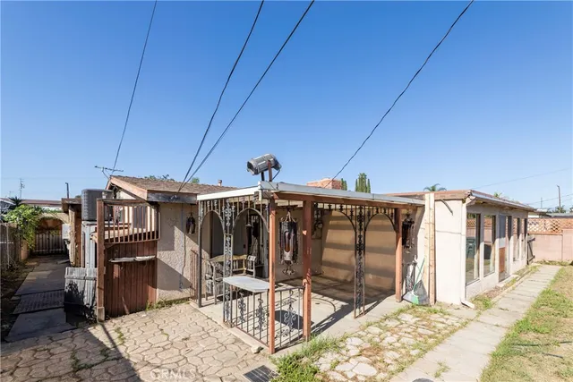 a view of a chairs and table in the terrace