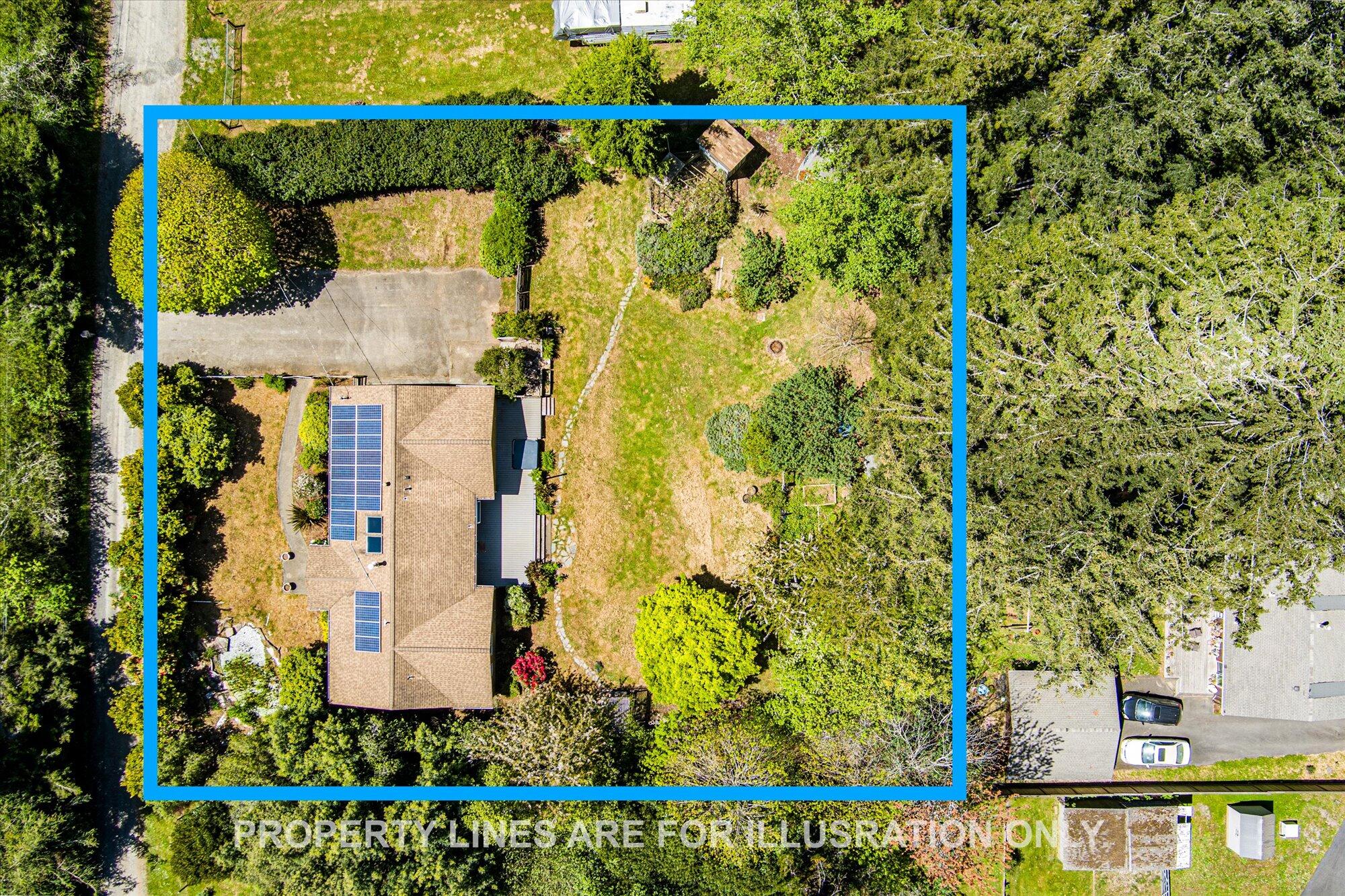 1945 Grange Road McKinleyville, CA 95519 - Photo 4 of 62 an aerial view of a house with a yard and garden
