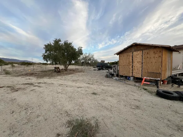 a view of car parked on the side of road