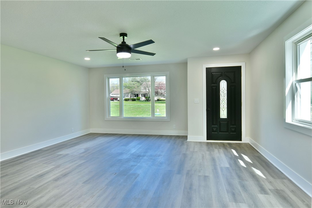 2096 Stillwagon Road Southeast Warren, OH 44484 - Photo 13 of 50 Entrance foyer with baseboards, a ceiling fan, recessed lighting, and wood finished floors