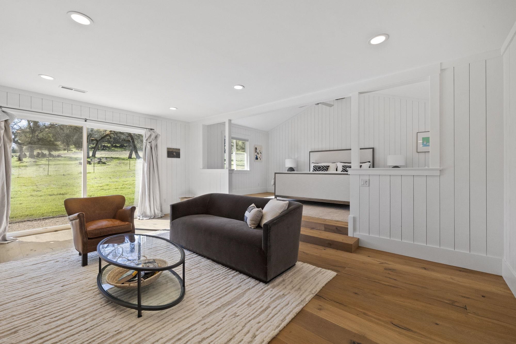 514 Appaloosa Road Angels Camp, CA 95222 - Photo 21 of 57 Large Sitting Room in Primary Suite with Step Up Bedroom is a True Luxury Setting