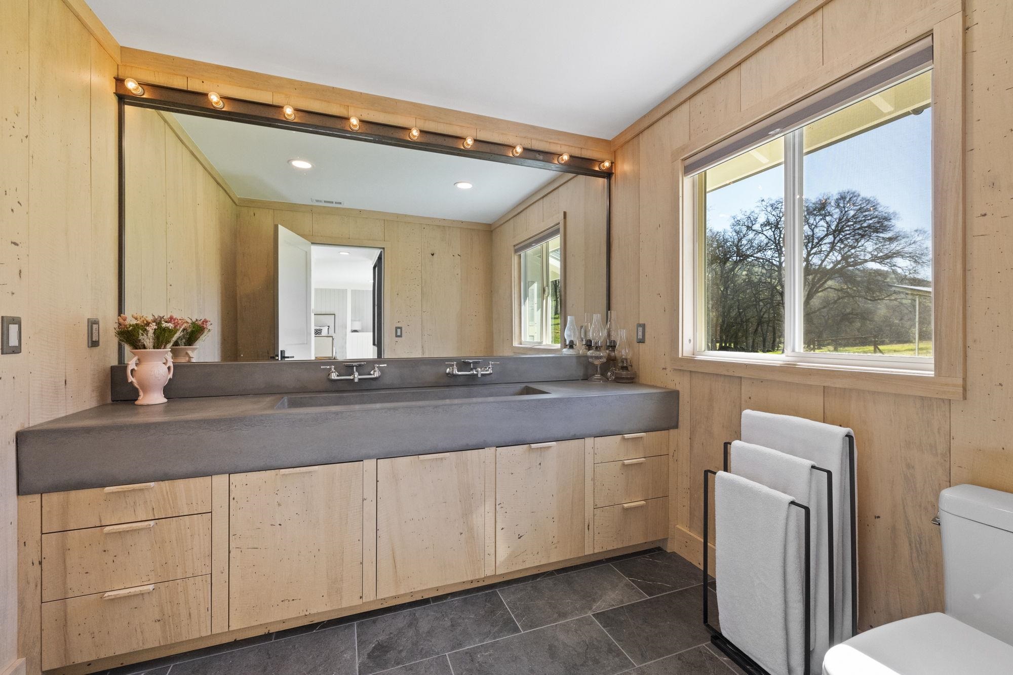 514 Appaloosa Road Angels Camp, CA 95222 - Photo 26 of 57 Designer Finishes on Walls, Cabinetry and Counters are Perfect Blend of Rustic Elegance