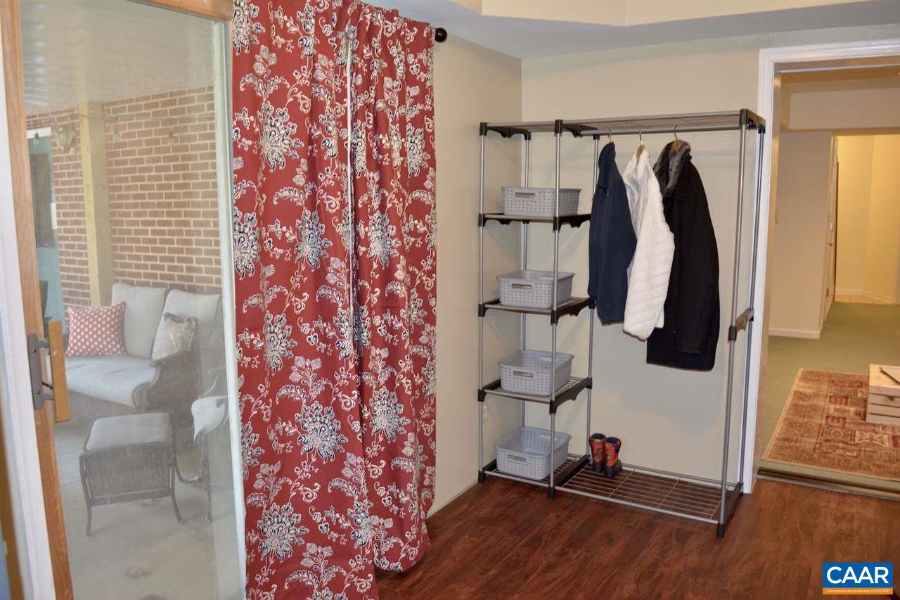 1167 Raintree Drive Charlottesville, VA 22901 - Photo 24 of 24 a view of walk in closet with clothes and shoes