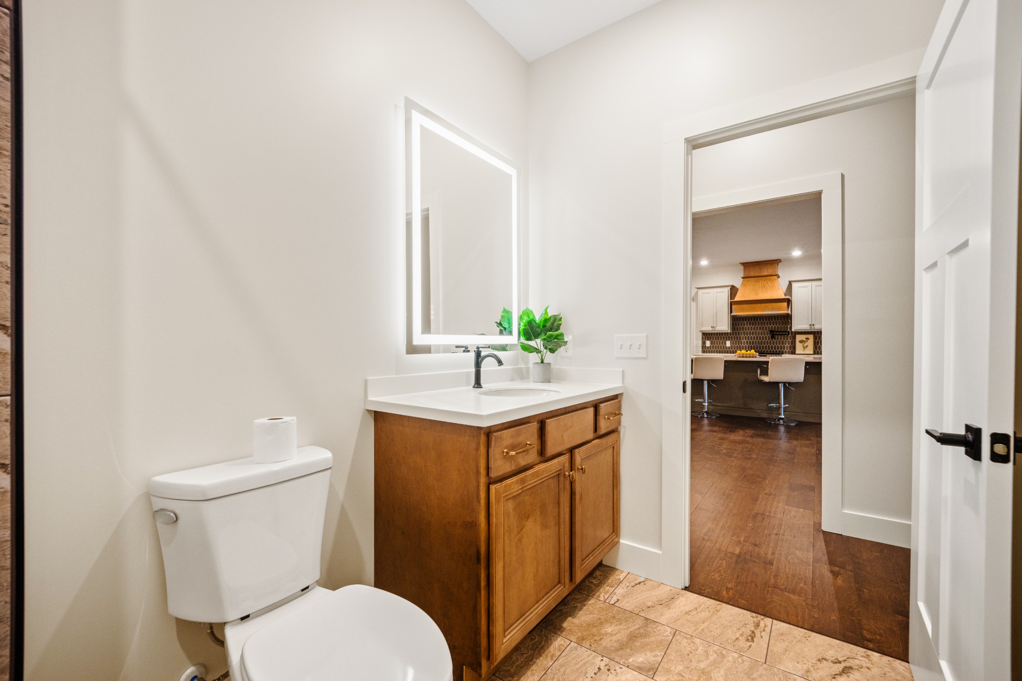 55 Hinchey Cemetery Road Paris, TN 38242 - Photo 11 of 38 a bathroom with a sink a toilet and a mirror