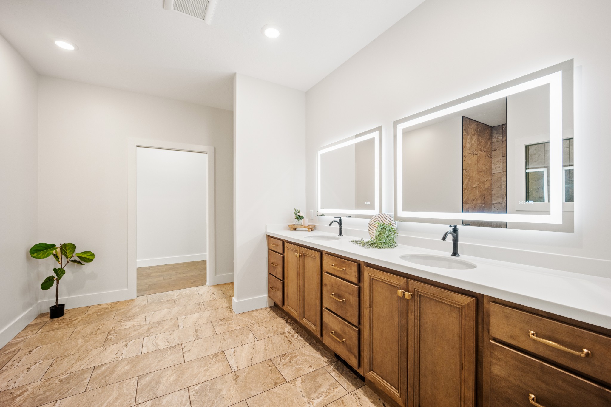 55 Hinchey Cemetery Road Paris, TN 38242 - Photo 16 of 38 a spacious bathroom with a double vanity sink and a mirror