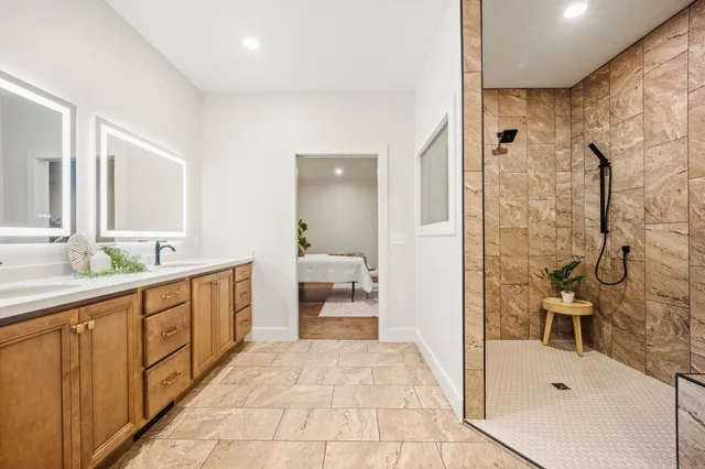 a bathroom with a sink and mirror