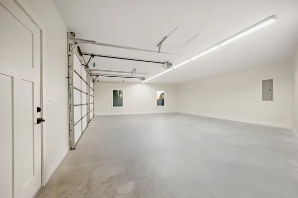 a view of a big room with white walls