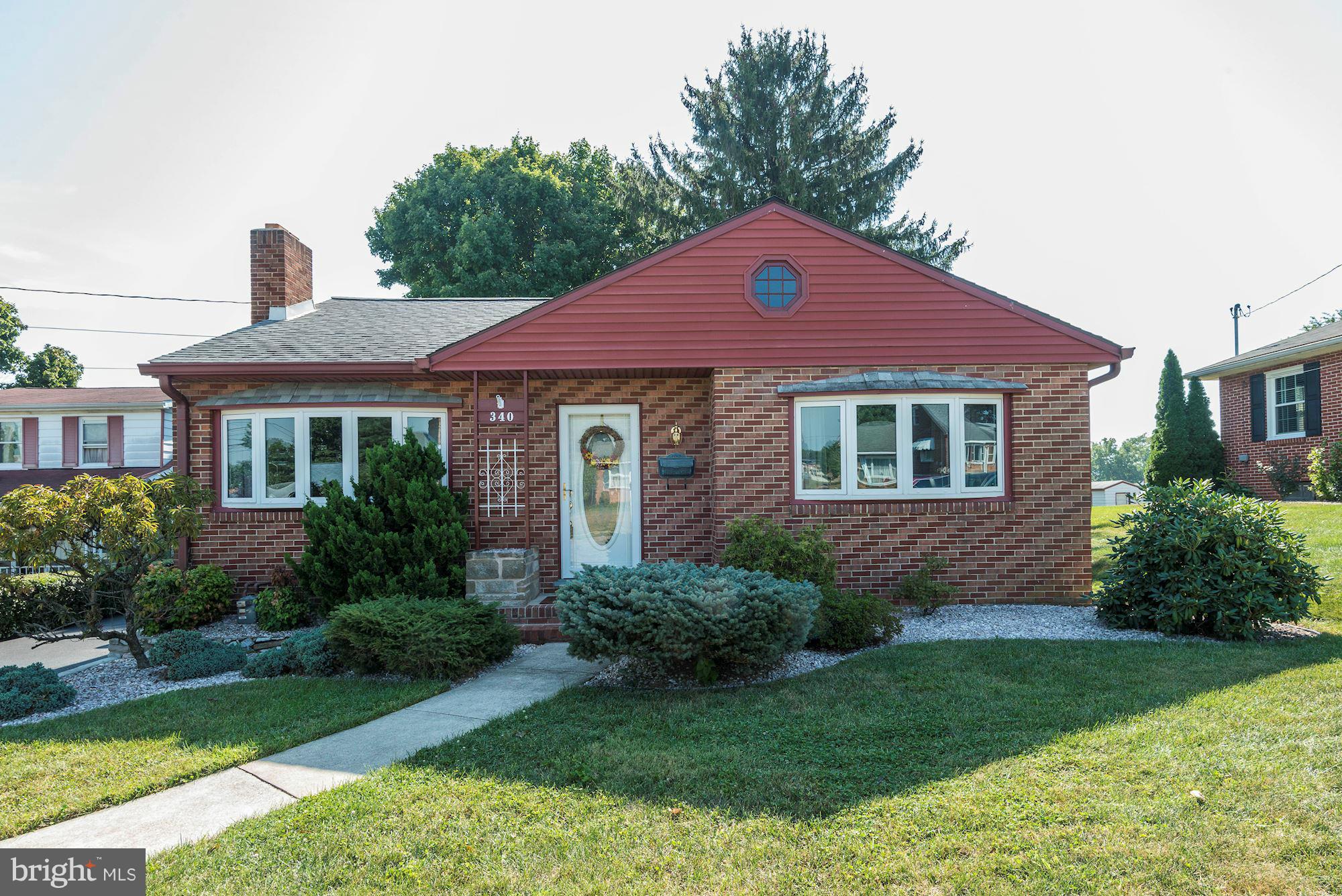 340 Nottingham Road Hagerstown, MD 21740 - Photo 2 of 30 a front view of a house with a yard