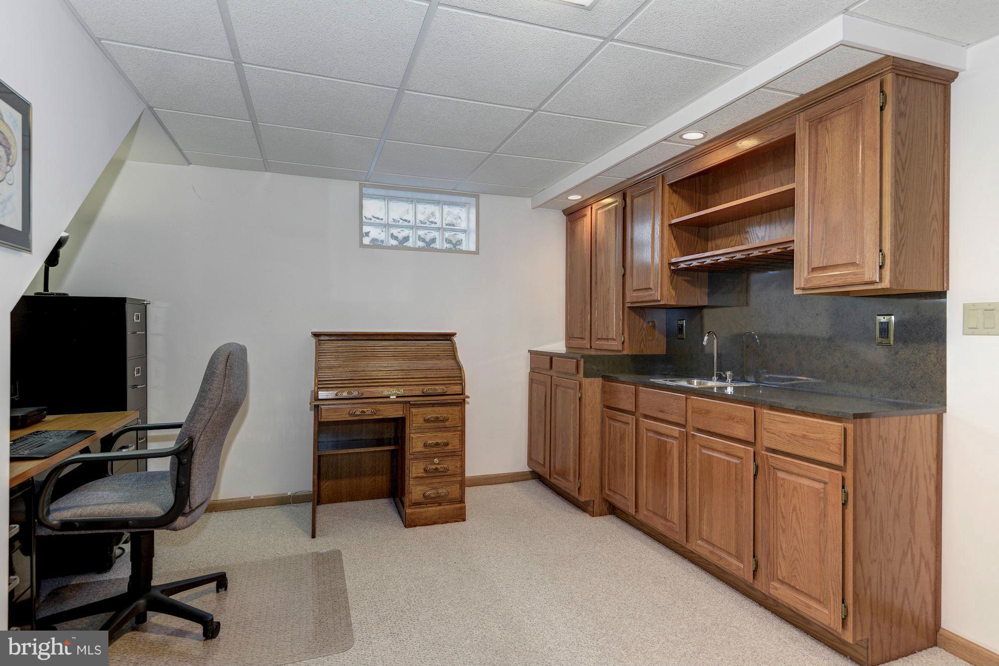 340 Nottingham Road Hagerstown, MD 21740 - Photo 18 of 30 a view of workspace with chair and cabinet