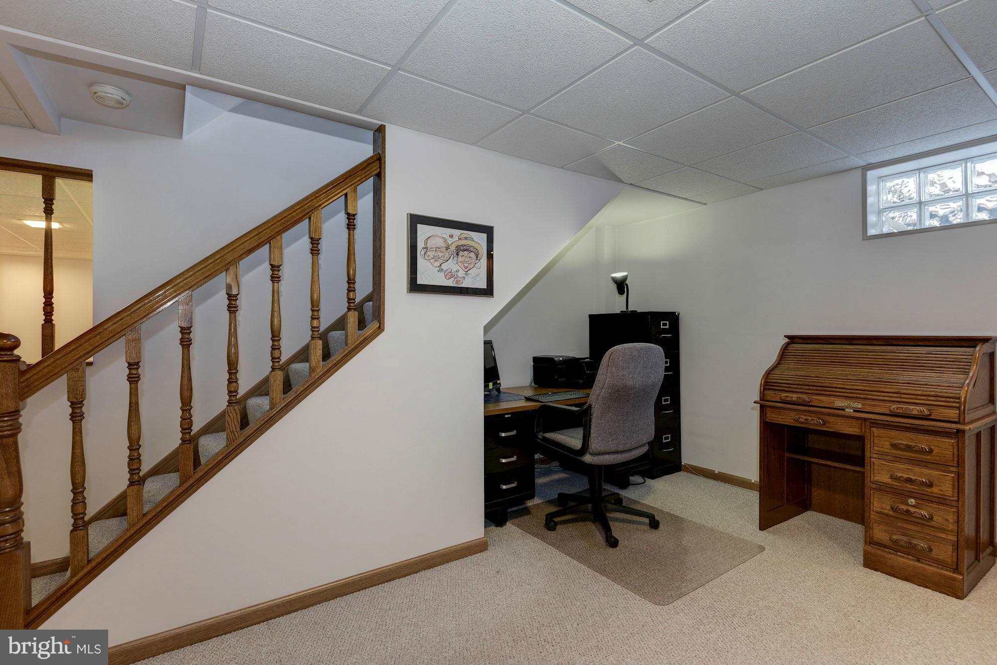 340 Nottingham Road Hagerstown, MD 21740 - Photo 19 of 30 a view of a workspace with furniture and a window