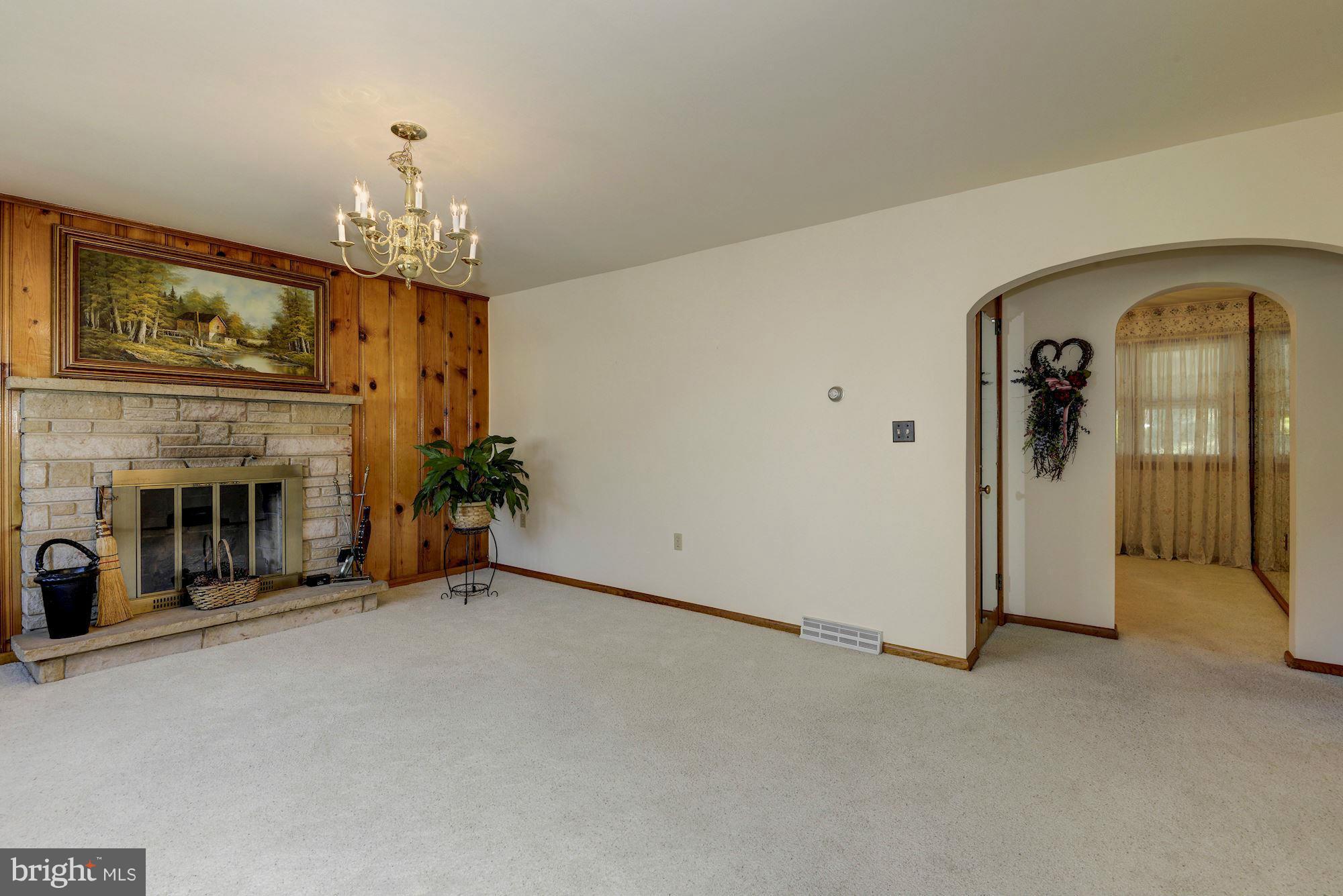 340 Nottingham Road Hagerstown, MD 21740 - Photo 3 of 30 a view of a livingroom with a fireplace
