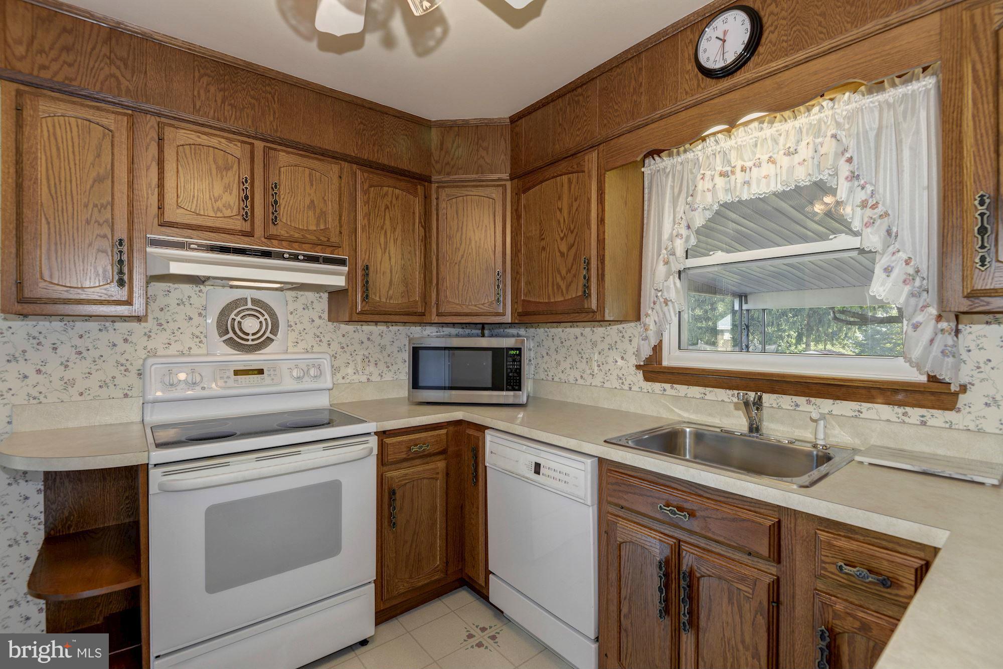 340 Nottingham Road Hagerstown, MD 21740 - Photo 8 of 30 a kitchen with a sink stove and cabinets