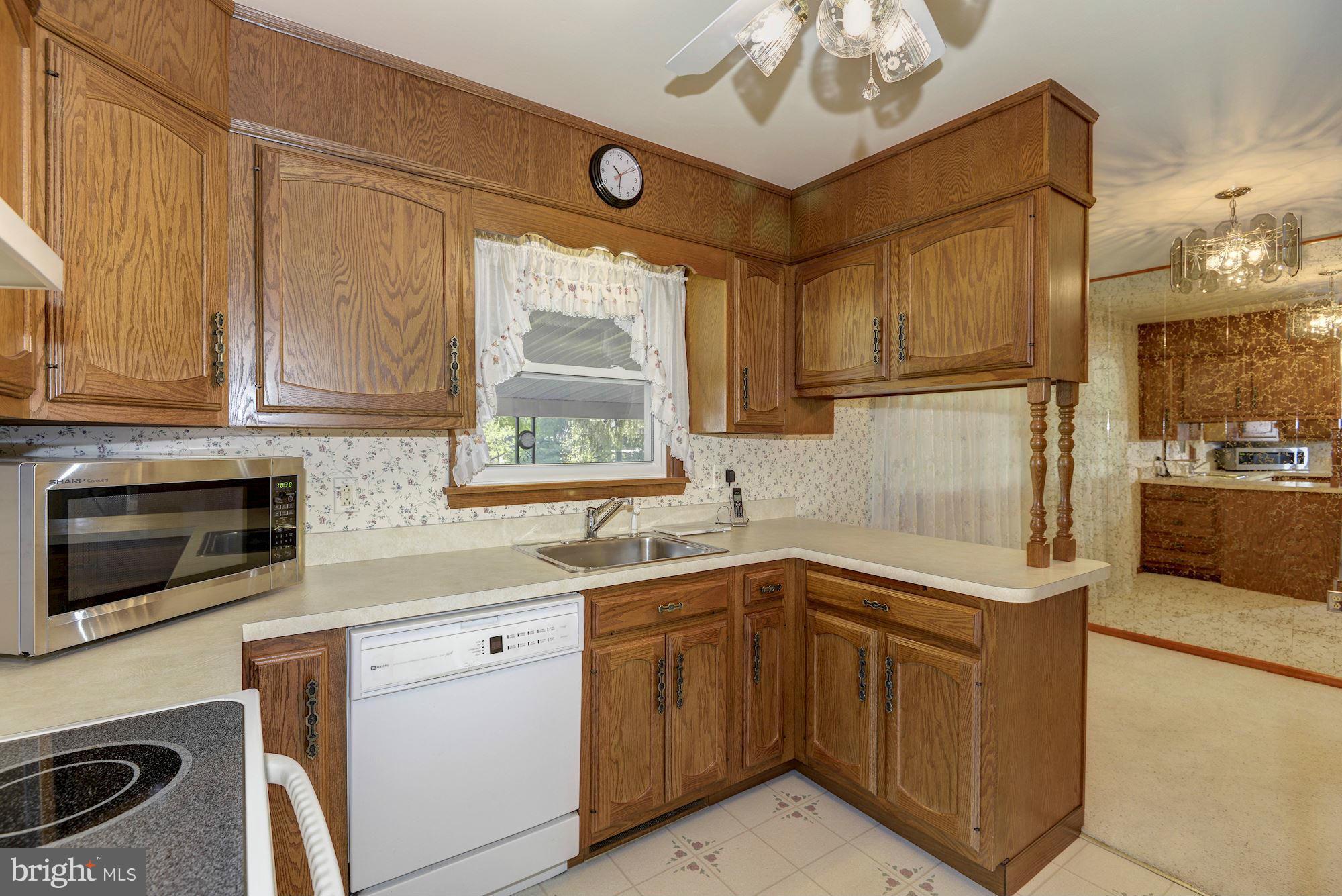 340 Nottingham Road Hagerstown, MD 21740 - Photo 9 of 30 a kitchen that has a sink and a stove top oven