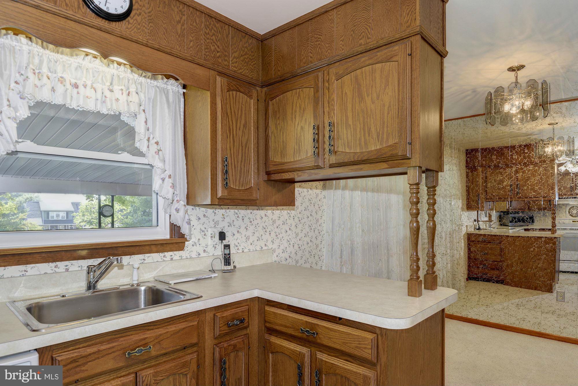 340 Nottingham Road Hagerstown, MD 21740 - Photo 10 of 30 a kitchen with stainless steel appliances granite countertop a sink and a microwave
